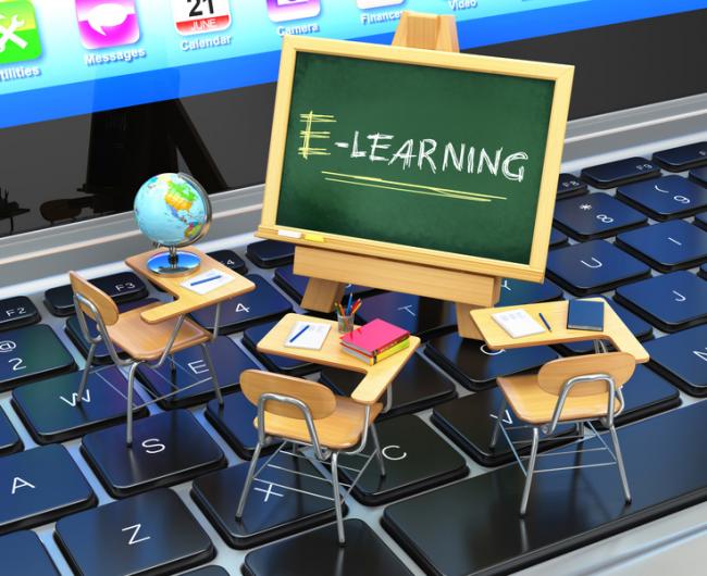 E-Learning chalkboard and desks on a keyboard